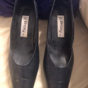 Proxy. Blue pumps. Bow accent in the back.